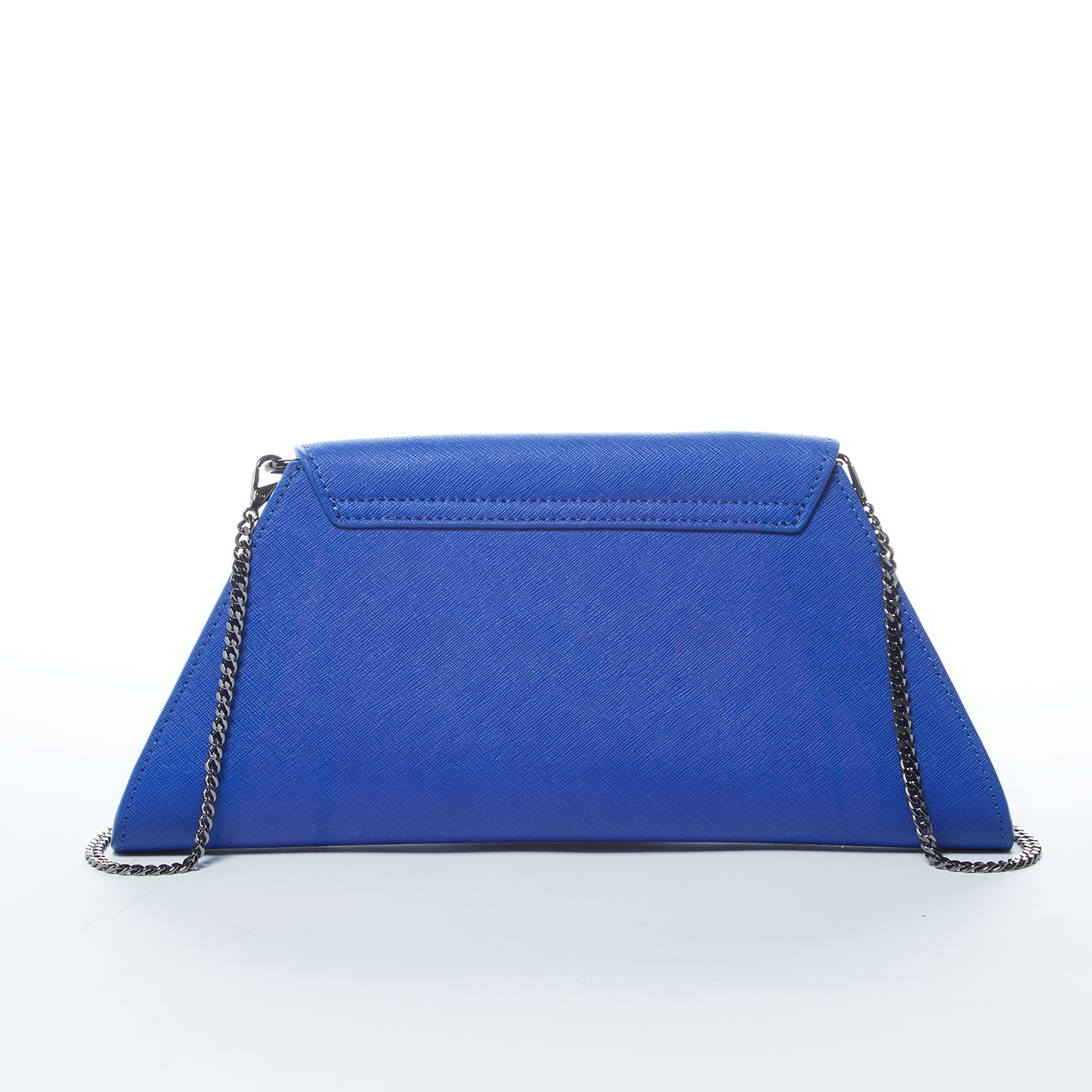 A SUSU Angelica Cobalt Blue Leather Clutch Bag featuring a triangular flap design and a silver chain strap.