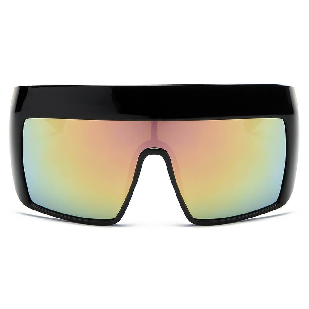 Peach-colored FOLSOM Oversize Shield Sunglasses by Cramilo Eyewear, featuring a frameless visor style with reflective rainbow-tinted lenses, displayed on a white background.