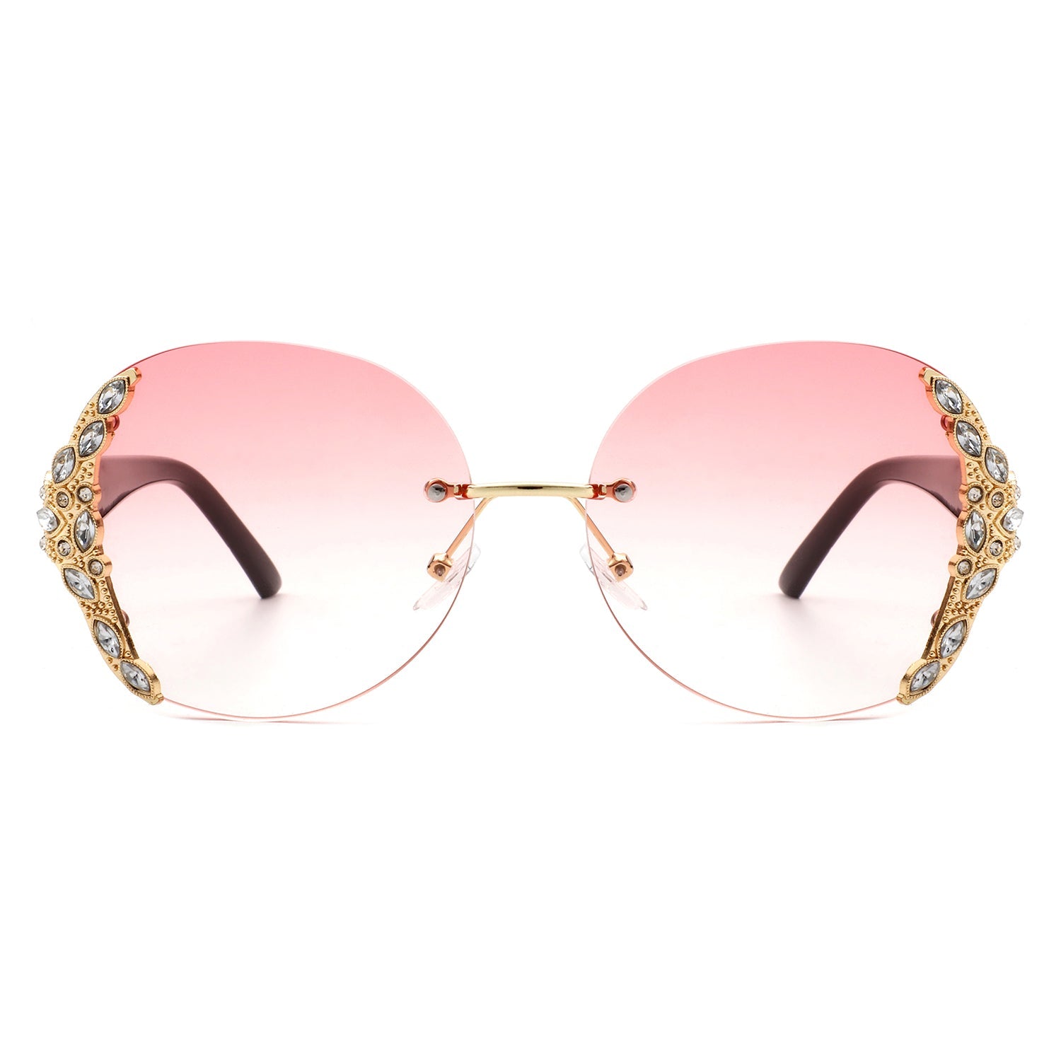 Stylish black sunglasses with oval rimless frames, pink gradient lenses, ornate gold detailing, and rhinestone design by Cramilo Eyewear.