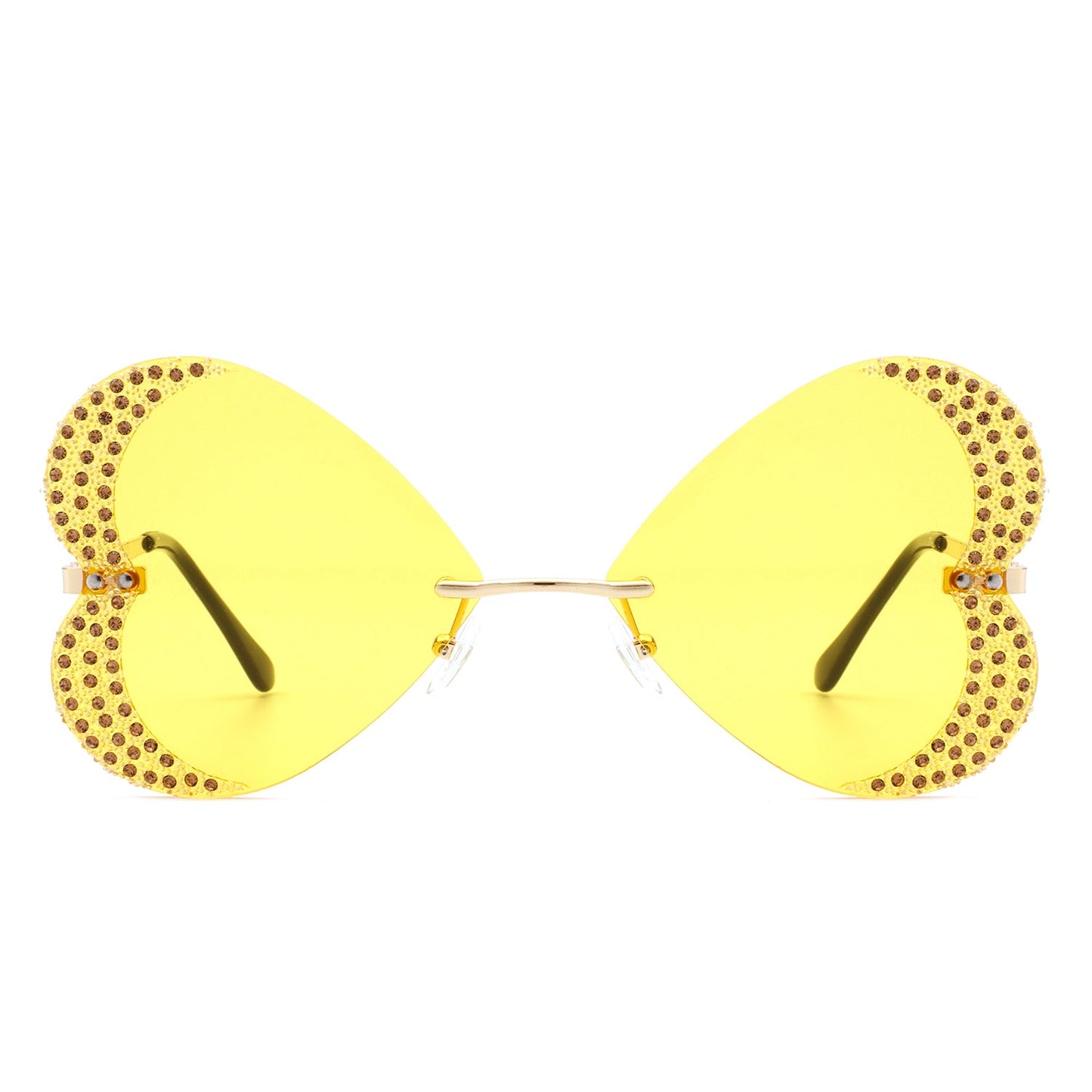 The Quixotia - Rimless Butterfly Heart Shape Tinted Fashion Women Sunglasses by Cramilo Eyewear are heart-shaped with purple lenses and golden arms, adorned with rhinestones along the edges.