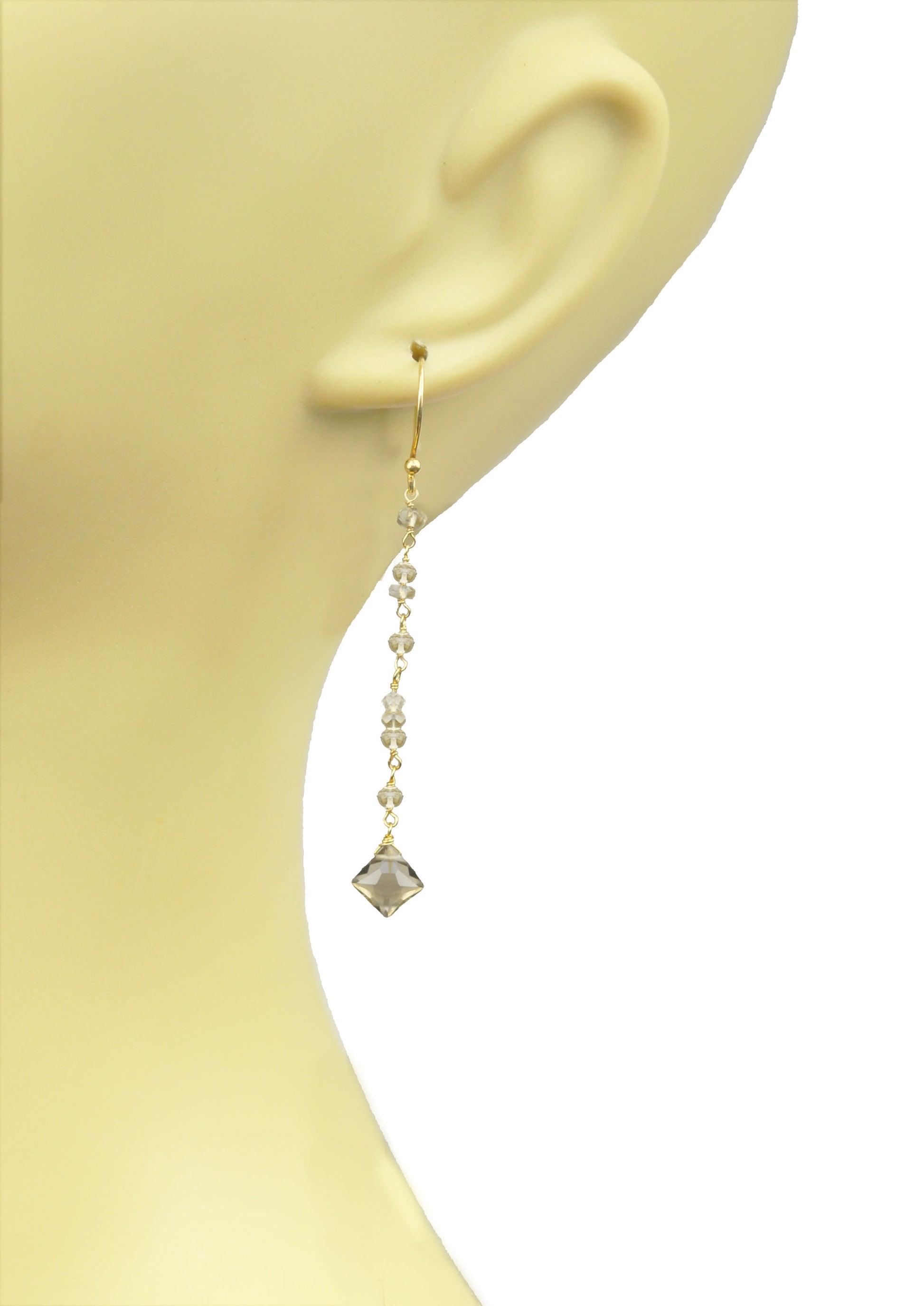 Smoky Topaz Linear Vermeil Earrings by Gena Myint feature gold hooks, translucent beads, and diamond-shaped pendants.