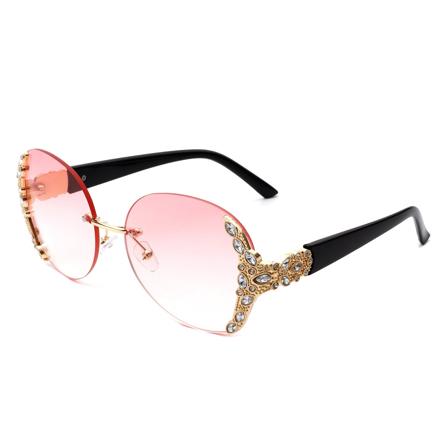 Stylish black sunglasses with oval rimless frames, pink gradient lenses, ornate gold detailing, and rhinestone design by Cramilo Eyewear.