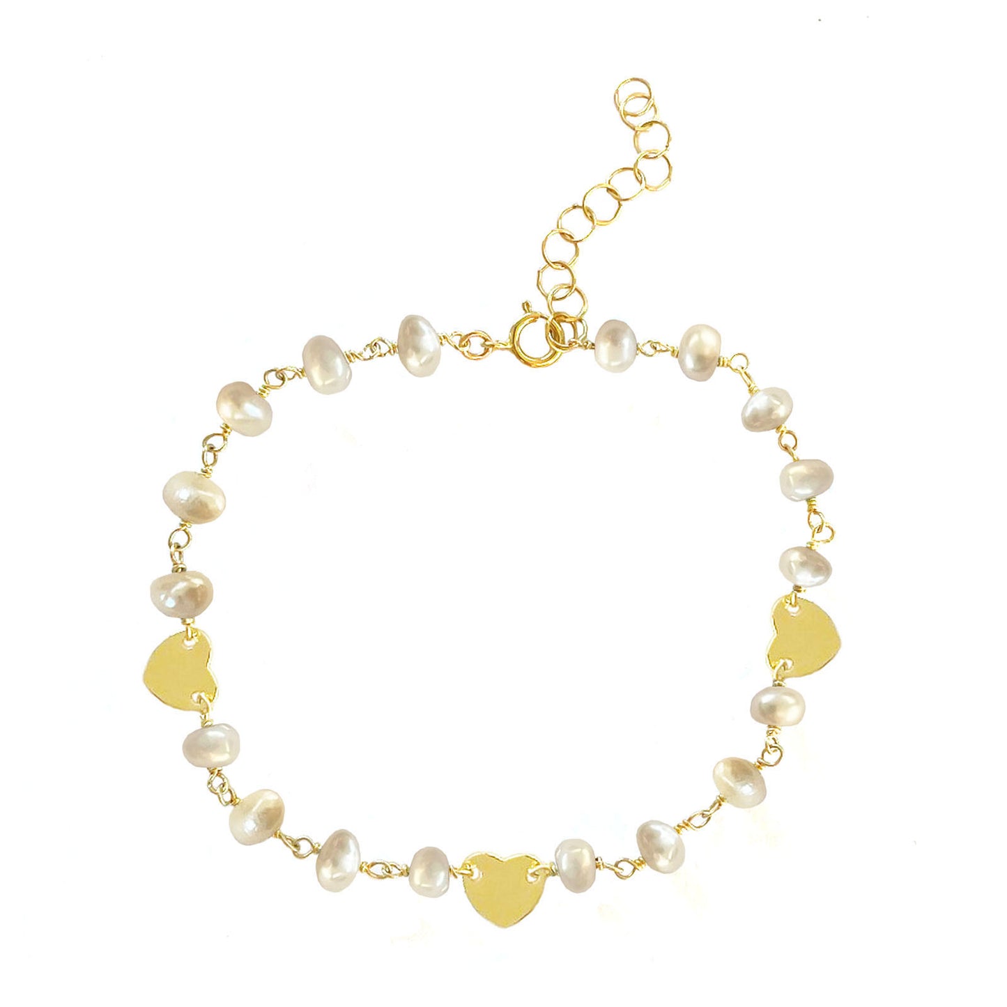 Gena Myints Pearl and Heart Charm Bracelet: A gold bracelet featuring pearl beads and three heart-shaped charms.